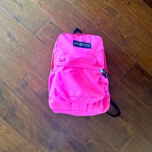 JanSports backpack- bright pink - some marks from wear and tear- clean